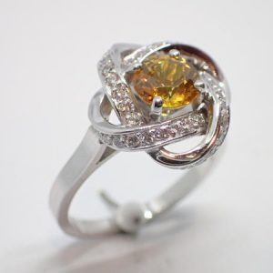 Bague saphir orange diamants