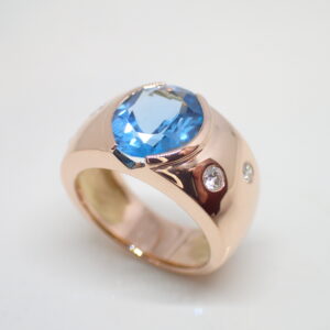 Bague jonc or rose topaze bleue et diamants